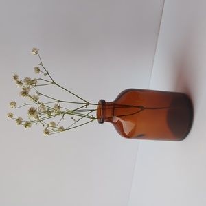 5 bud vases, amber color